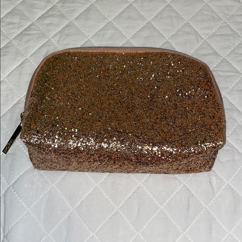 Small gold cosmetic bag